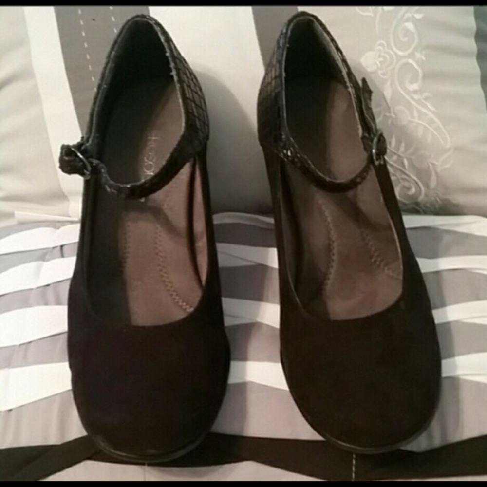Black faux suede and patent Mary Janes.
